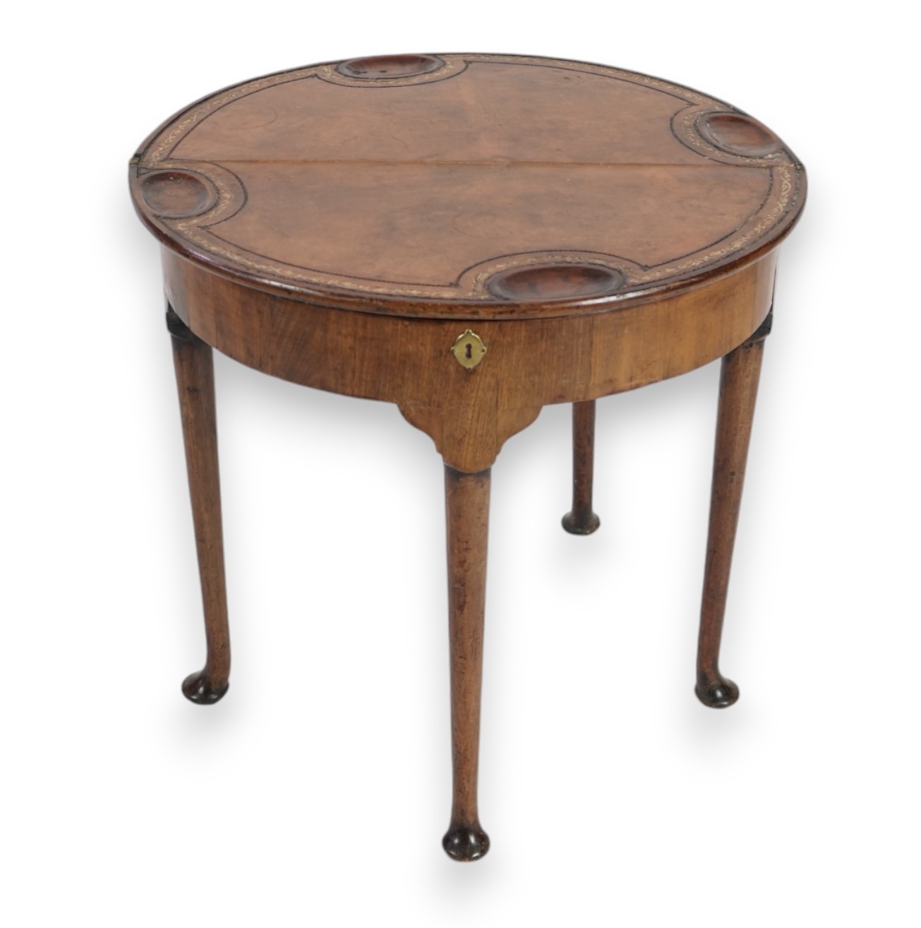 A George III mahogany triple top tea and games table